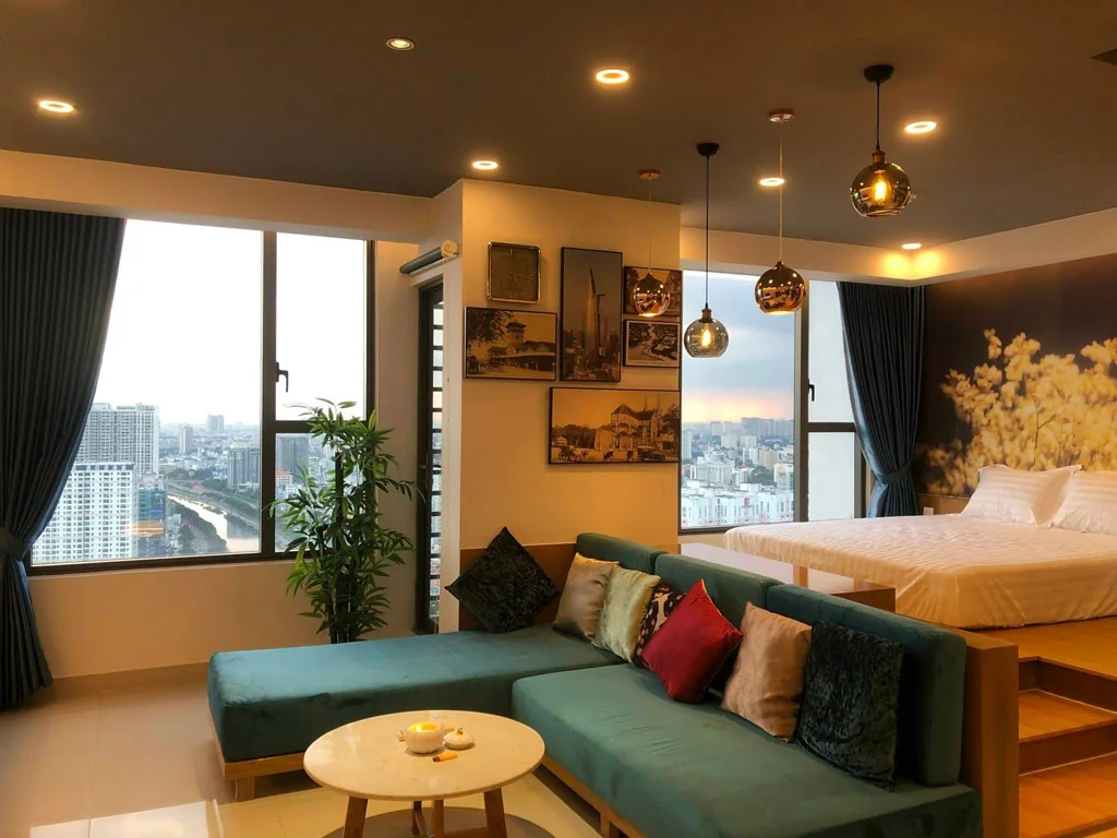 Góc ngồi nghỉ kết nối không gian ngủ trong một căn RiverGate Residence