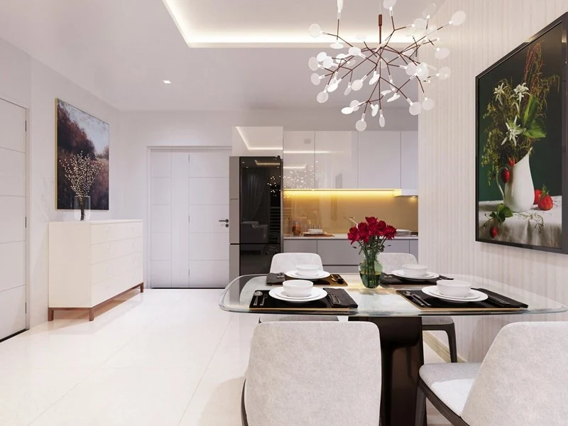 Khu bàn ăn và bếp trong căn hộ mẫu Citrine Apartment