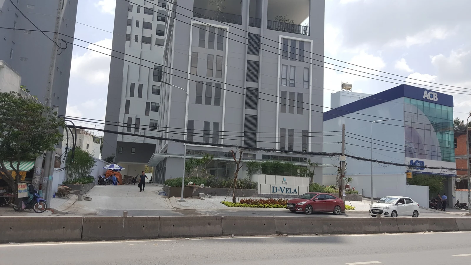 Mặt tiền D-Vela trên đường Huỳnh Tấn Phát, ảnh công bố tháng 6/2025.